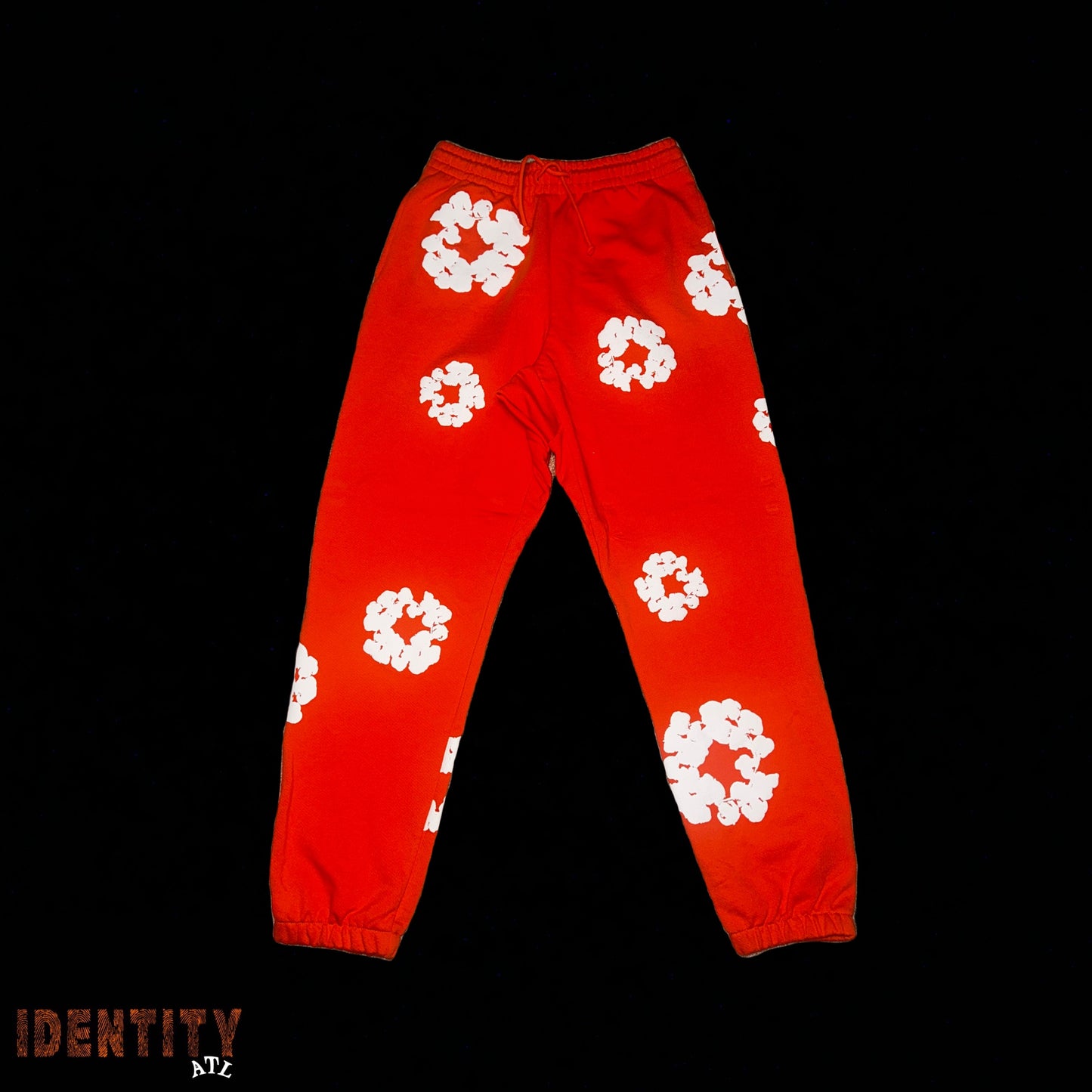 DENIM TEARS SWEATPANTS ORANGE